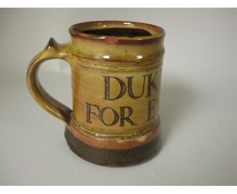 A Michael Cardew, Winchcombe pottery cylindrical pottery Tankard, titled, Duke Edward For Ever, 1936. 4 1/2in H