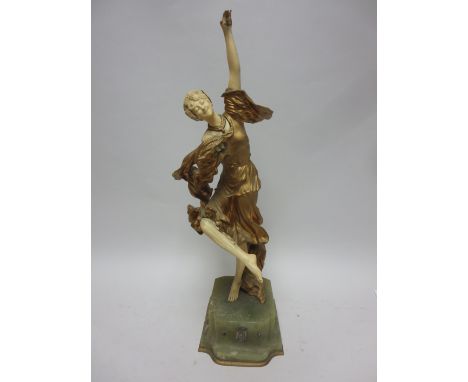 A French Art Deco ivory and gilt metal Figure of female dancer, on onyx base with plaque having crowned monogram, 19in, A/F i