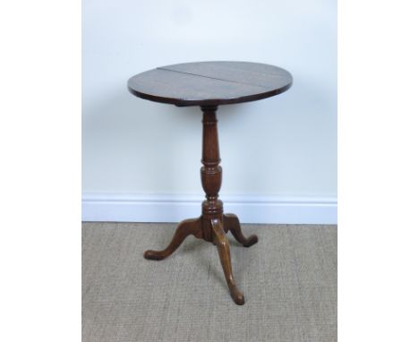 An antique oak Pillar Table with circular top on turned column and tripod base, 18in, a carved oak Spinning Chair and an old 