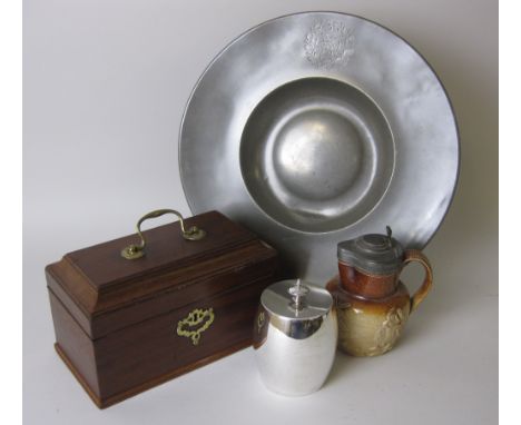 A pewter wide rimmed Dish with date and coat of arms 1714, 14 1/2in D, a plated barrel shaped Tea Caddy, a mahogany sarcophag