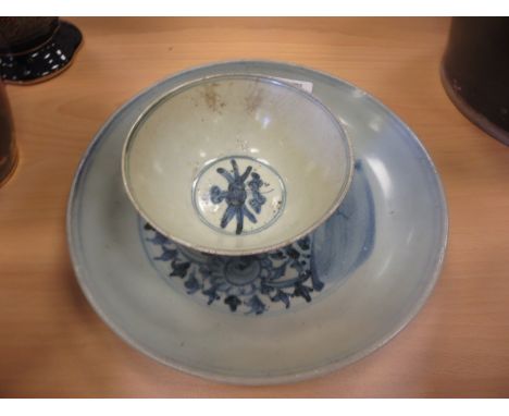 An early Chinese Bowl decorated inner and outside with swags, with encrustations on base, former Cargo item, 5in D and a Chin