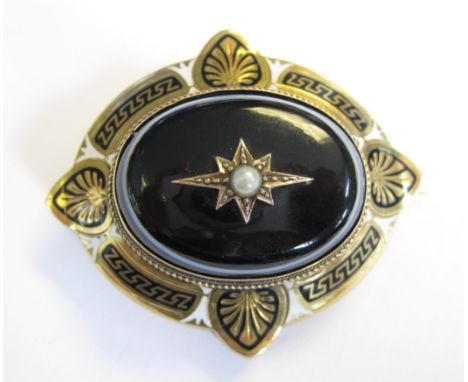 A Victorian Mourning Brooch set seed pearl on ringed agate within enamel frame, lock of hair verso