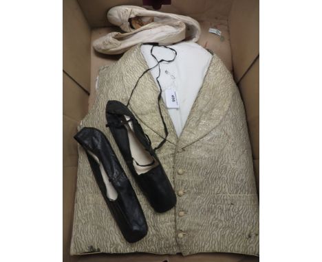 A pair of black leather square toed ladies Shoes labelled Paris 73, handwritten stock marks, a later pair of cream satin shoe