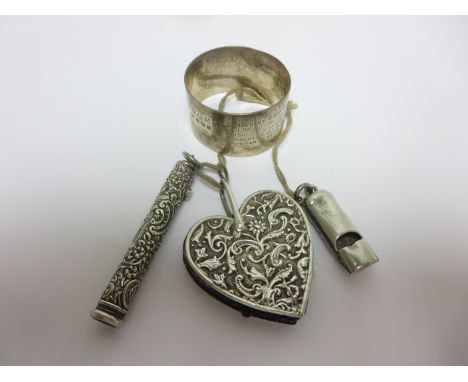 A Victorian silver heart shape Pin Cushion embossed leafage scrolls, Birmingham 1897, a silver Extending Pencil by S Mordan a