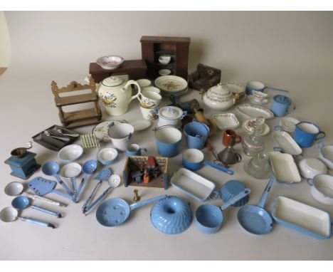 The blue and white enamel contents of a larger scale German kitchen including a coffee grinder and a later model room with so