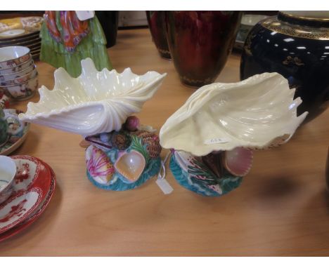 A pair of 19th Century Worcester Shell Dishes on polychrome shell moulded bases, 6 1/2in, impressed mark. Restored¦