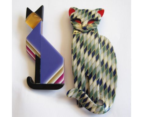 Two Lea Stein Cat Brooches in acrylic with geometric designs and two Cynthia Chuang ceramic Stick Pins and a Brooch