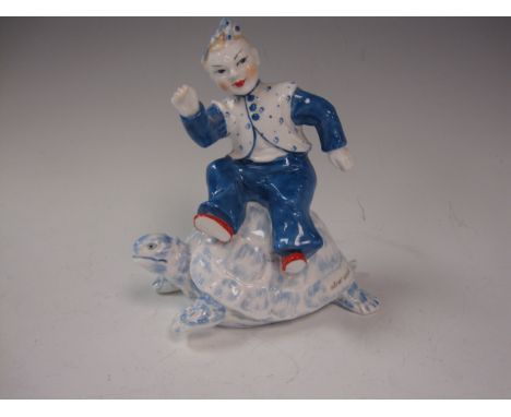 A rare Royal Worcester Figure from the  Chinese Sayings  series, modelled by Agnes Pinder-Davis in 1953, titled  Slow Coach ,