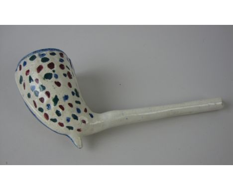 A large scale pottery Pipe, Scottish C1835, with coloured spotted decoration, blue line decoration, 8 /12in long