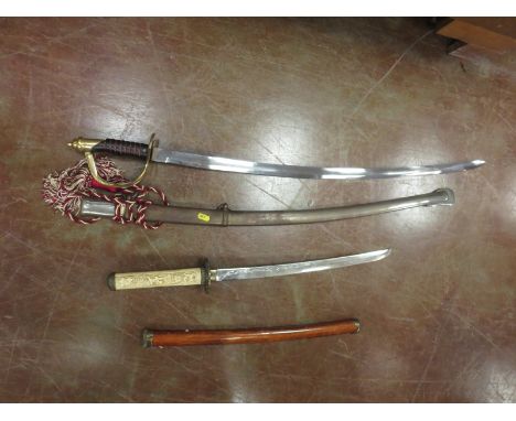 A No. 4 Mark II Spike Bayonet and Scabbard, a Lee Enfield type Bayonet and Scabbard, straight double edged Sword with open sp