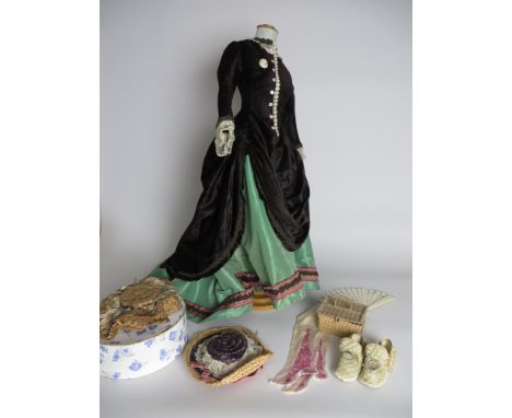 A Dress and Overdress made for a portrait Jumeau. The skirt in green taffeta. 24in L. Two early straw hats, straw basket, cel