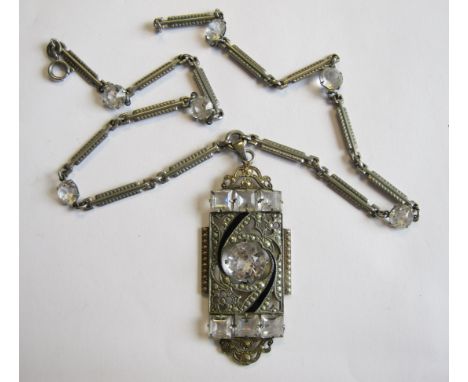A paste set Necklace with pierced rectangular plaque claw-set circular central paste between rows of square-cut paste with bl