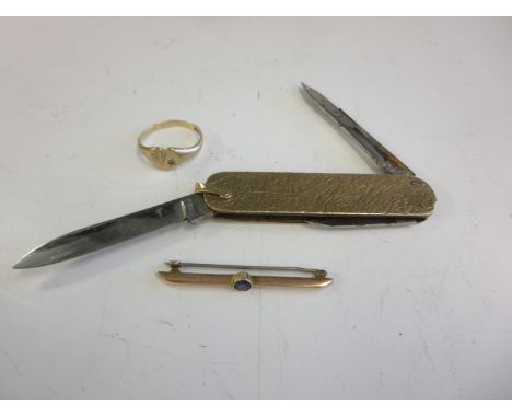 A 9ct gold cased folding Penknife with scissors, Birmingham 1971, a 9ct gold Signet Ring set chip diamond and a 9ct Tie Pin s