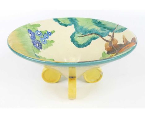 A 1930s Clarice Cliff Fragrance pattern pottery table bowl, of conical form, with four circular disc feet, bright colour deco
