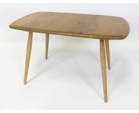 An Ercol blond elm low occasional table, model No. 213, raised on typical turned tapering supports, h.44.5cm, length 72.5cm, 