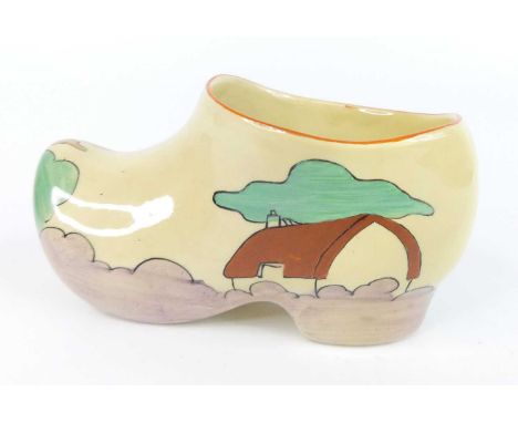 A 1930s Clarice Cliff Red Roof Cottage pattern pottery large clog, typically bright colour decorated, black printed backstamp