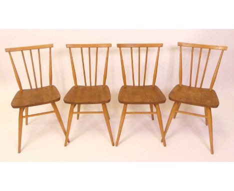 A set of four 1960s Ercol blond elm model 391 stickback kitchen chairs, raised on turned slightly tapering supports, w.40cm E
