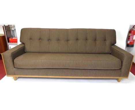 A contemporary G-Plan Vintage Range 'The 54' three-seater sofa, having long removable cushioned back and seat, beech framed e