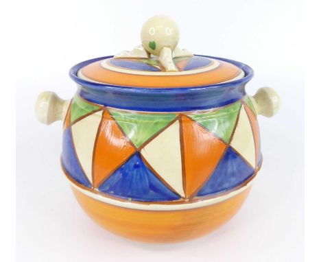 A 1930s Clarice Cliff Original Bizarre pattern pottery biscuit barrel and cover, of bulbous form, with twin flower head handl