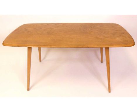 A 1960s Ercol blond elm Windsor model 382 dining table, having rounded corners, on square tapering supports, h.71.5cm, length