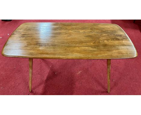 A 1960s Ercol blond elm Windsor 382 dining table, having rounded corners, on square tapering square supports, h.71.5cm, lengt