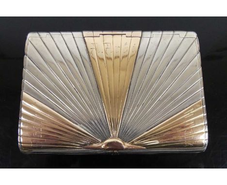 A probably Russian Art Deco silver and silver-gilt cigarette case, of rectangular form with rounded sides, having bi-colour s