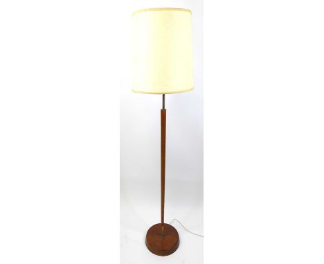A 1970s teak and rodded metal standard lamp, of plain turned and slightly tapering form, h.134cm (excluding fittings)