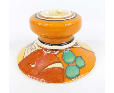 A 1930s Clarice Cliff Melon pattern squat candlestick, typically bright colour decorated, black printed backstamp verso, h.5c