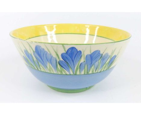 A 1930s Clarice Cliff Blue Crocus pattern small bowl, typically bright colour decorated, with slightly proud foot, black prin