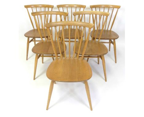 A set of six Ercol blond elm stickback dining chairs, model No. 449, each with slightly dished seats and raised on turned and