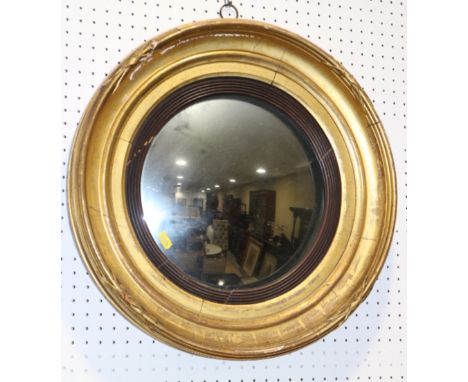 A 19th century gilt framed circular convex mirror, 11" dia