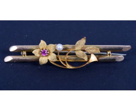 A 15ct gold, ruby and seed pearl bar brooch, 2.7g