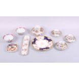 Three 20th century Dresden cabinet cups and saucers, a larger similar cup and saucer, a Dresden
