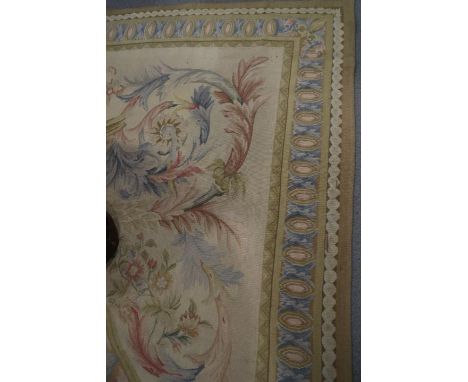 An Aubusson type carpet of Adam design with floral and acanthus scrolls and landscape centre, 165" x 119" approxCondition:Som