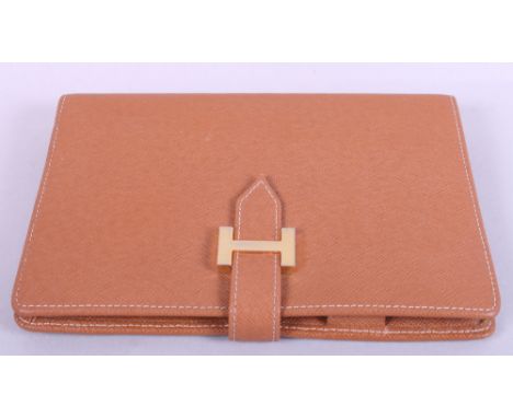 An Hermes brown "leather" Filofax cover
