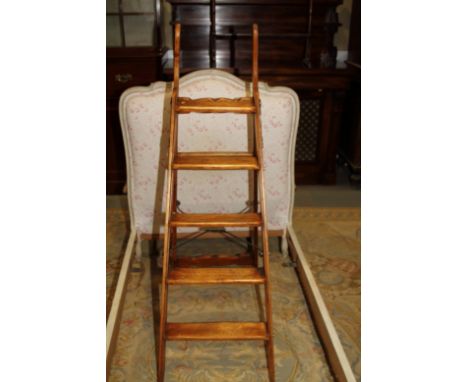 A Simplex stripped pine and iron mounted five-step folding library ladder, 53 1/2" high