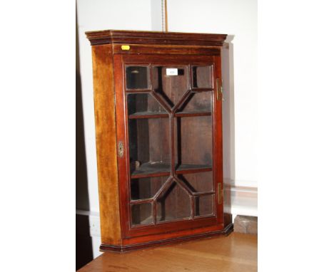 A mahogany corner cabinet enclosed glazed panel door, 20" wide, and a mid 20th century mahogany oval wall mirror
