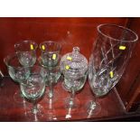 A Waterford crystal vase, by John Rocha, 13 3/4" high, a raised glass bowl and cover and seven green
