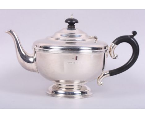 A silver teapot with ebonised knop and handle, 14.3oz troy approx