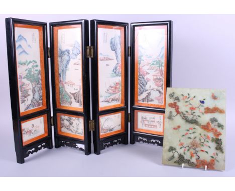 A Chinese ebonised screen, decorated panels, 18" high, and a jade panel, decorated foliage, 9 3/4" highConditionScreen is fin