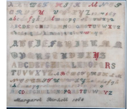 A 19th century needlepoint sampler, by Margaret Birkett, dated 1868, 7 1/2" x 8 1/4", in maple frame