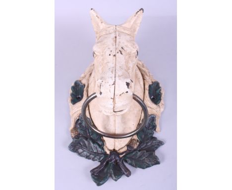 A cast iron door knocker, in the form of a horse head, 11" high