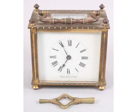 A brass and glass cased carriage clock with white dial and Roman numerals, by Mawson Swan and Morgan, 3 1/4" h x 3 1/2" w x 2