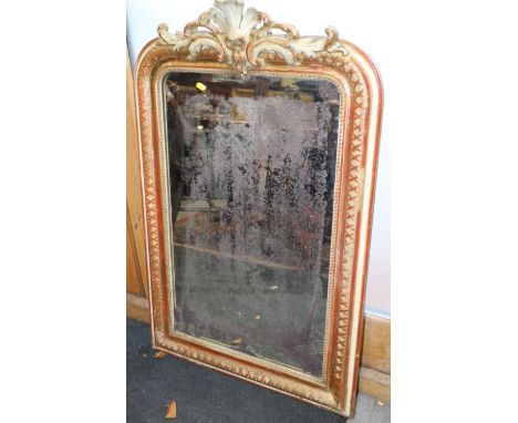A "Venetian" rectangular red, white and gilt framed wall mirror, 31" x 19"