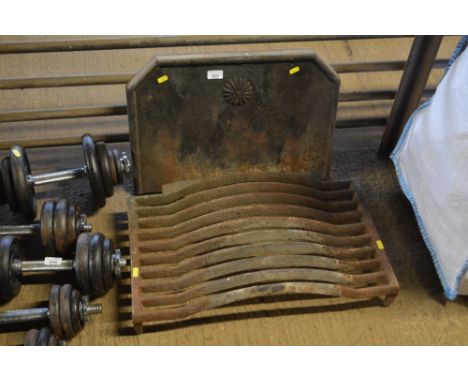 A cast iron fire grate and back