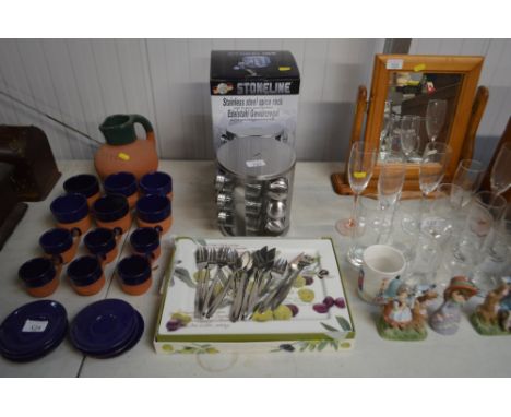 A Stoneline spice rack; together with a quantity of cutlery and boxed plates