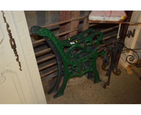 A pair of cast iron bench ends