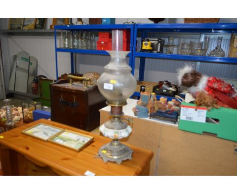 A table lamp with clear glass shade 