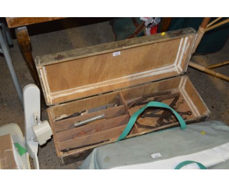A wooden tool box and contents of tools