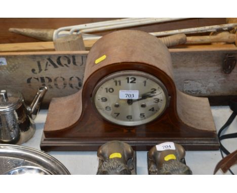 A mahogany and inlaid cased two hole mantel clock 